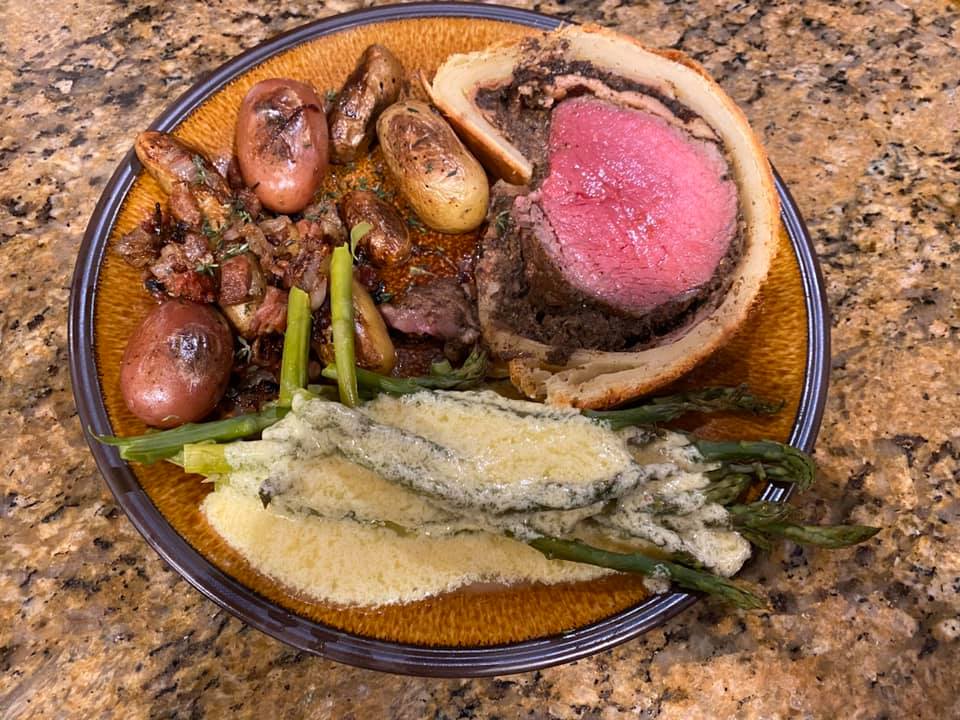Christmas dinner: marrowbones with toast and Beef Wellington mixe